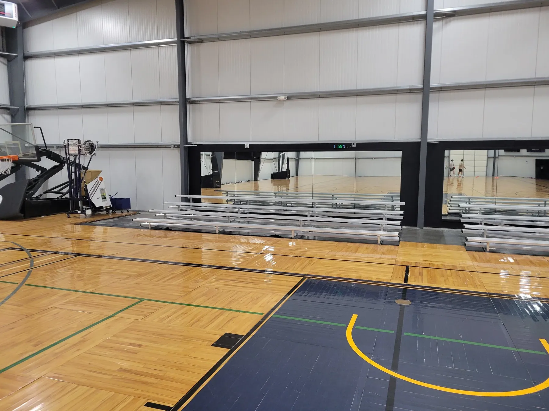 Bleacher seating inside a gymnasium for an indoor sports event